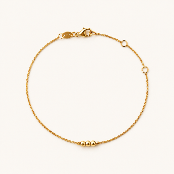 Adelsband Imperial in Gelbgold – Freisteller der Kette mit drei Goldkugeln