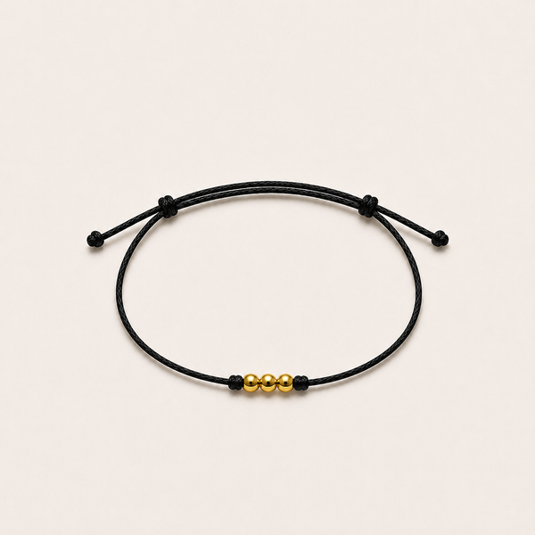 Adelsband Signature – Seidenband mit Goldkugeln